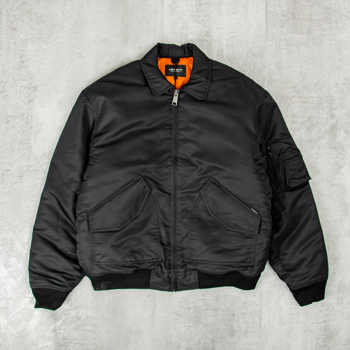 Buy the Carhartt WIP Olten Bomber - Black / Tumeric@Union