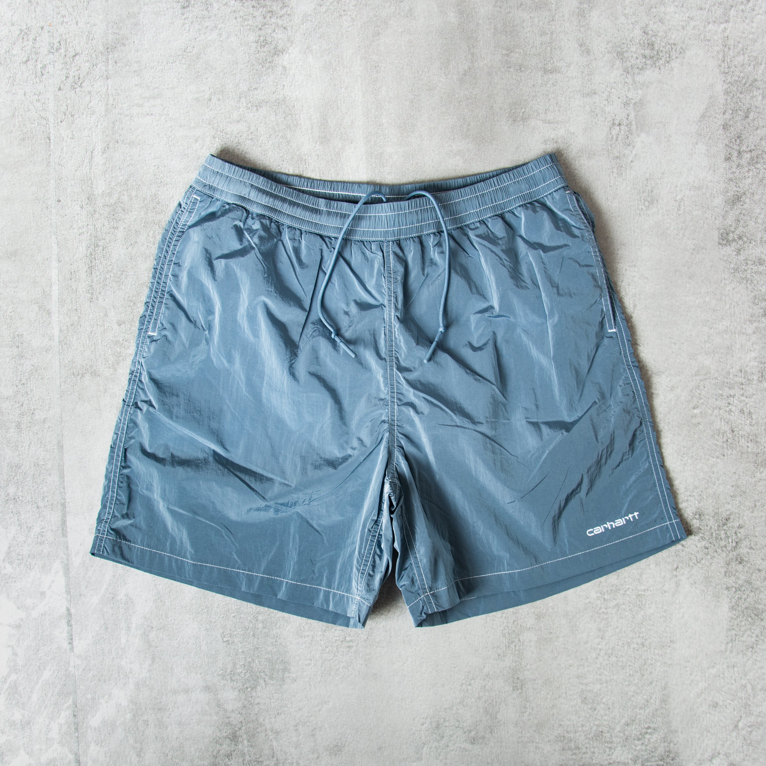 Buy the Carhartt WIP Canby Swim Trunks - Clay Blue / White @Union