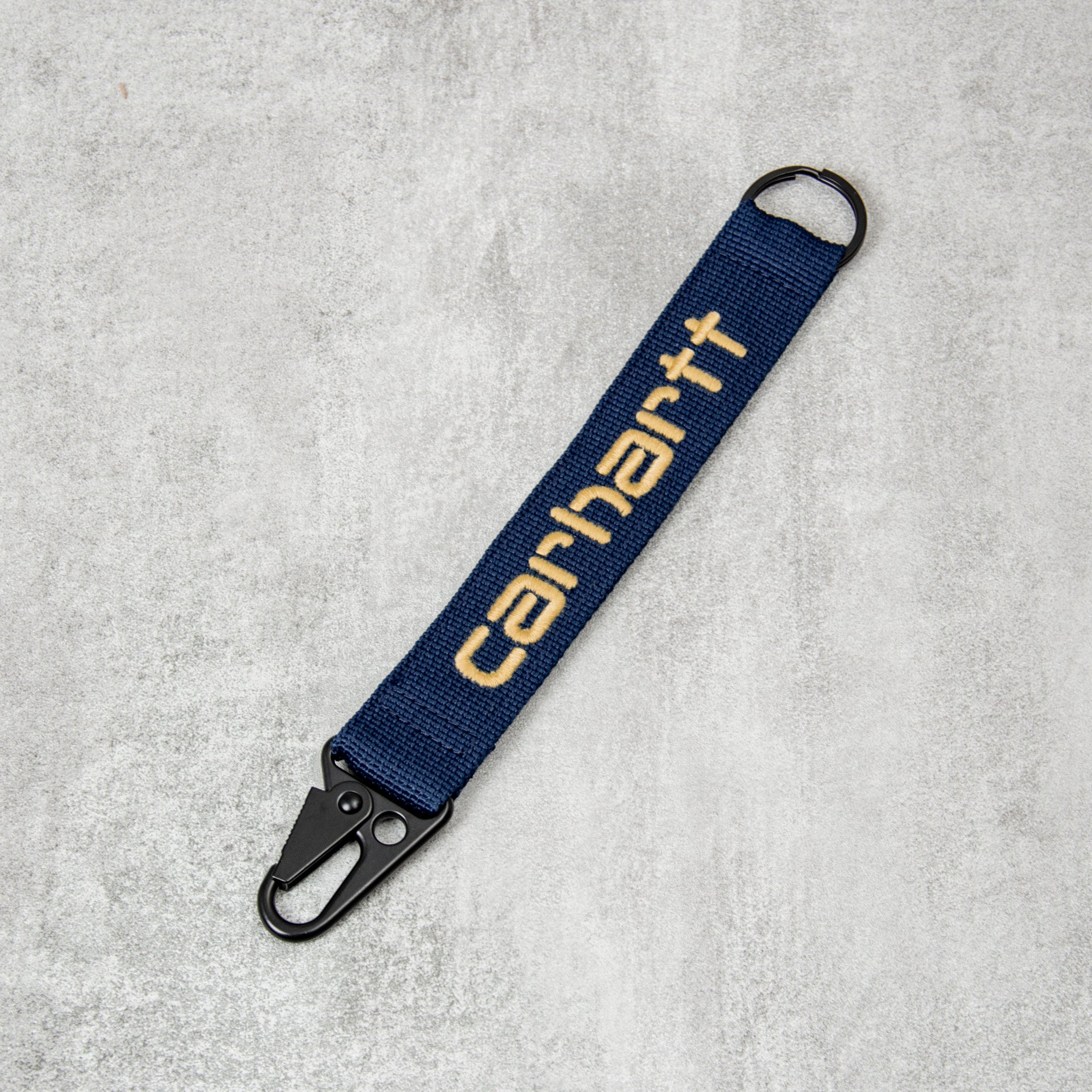 Buy the Carhartt WIP Jaden Keyhokder - Ink / Air Yellow
