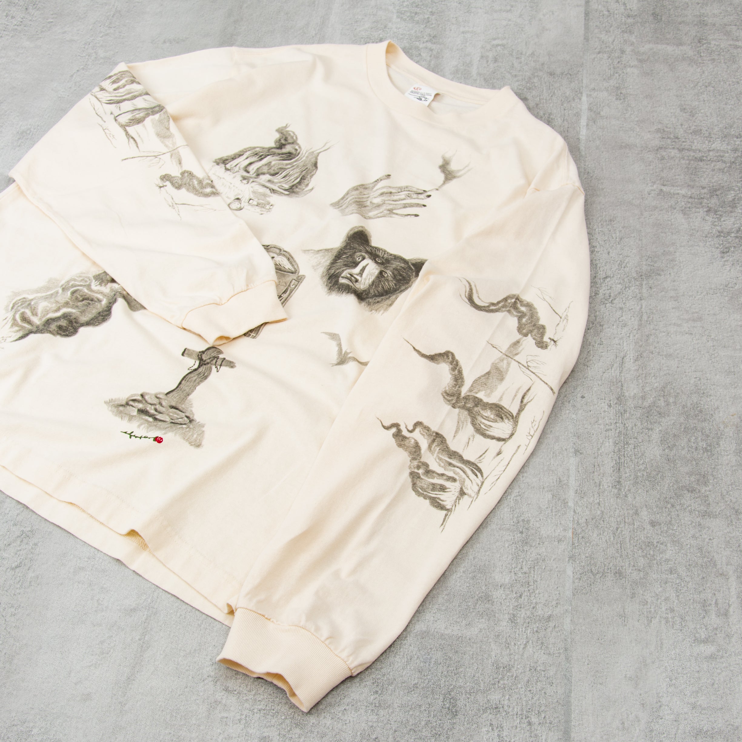 トップス 00s archive CDG x Noah Lyon art knit Buy Nudie x Jeff Olsson Rudi Doodle L/S Tee - Off White@Union